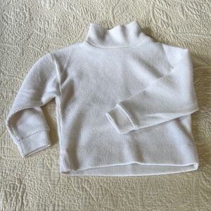Cream ribbed mock turtleneck sweater